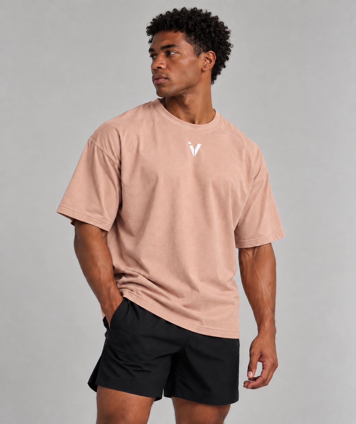 Inner Voice Heavy Tee in Sandy Rose, angled view on model